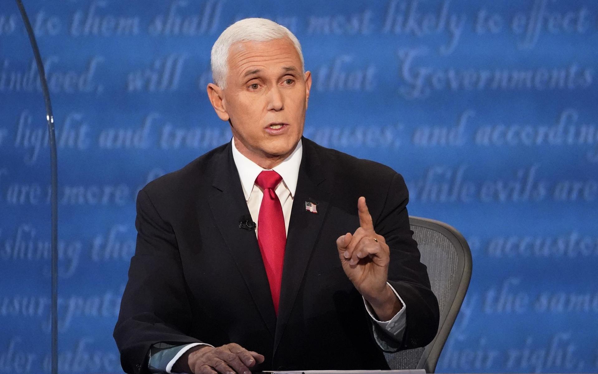 Vice President Mike Pence makes a point during the vice presidential debate with Democratic vice presidential candidate Sen. Kamala Harris, D-Calif., Wednesday, Oct. 7, 2020, at Kingsbury Hall on the campus of the University of Utah in Salt Lake City. (AP Photo/Julio Cortez)  DBT180