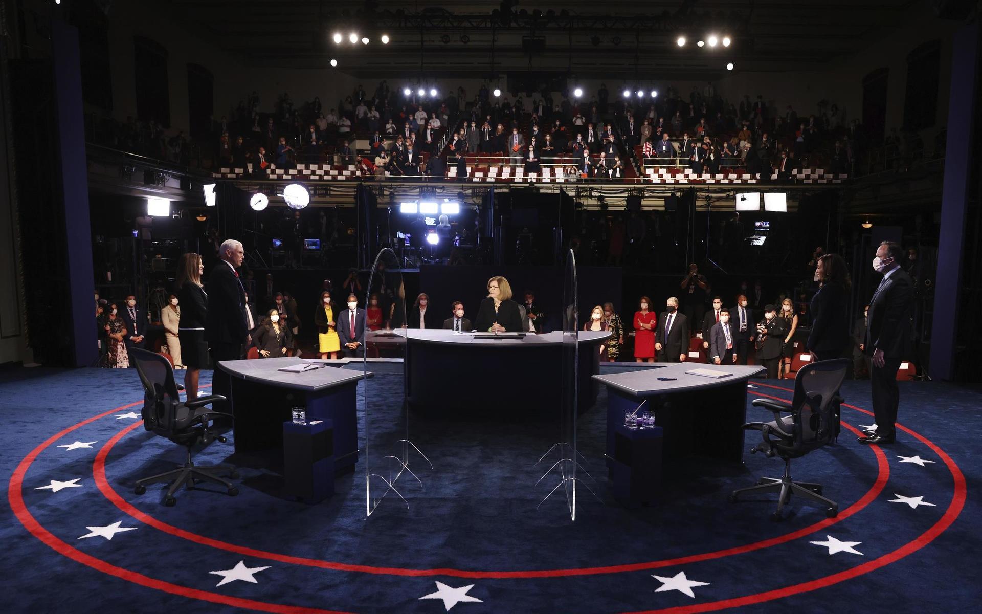 Karen Pence and Vice President Mike Pence, stands on stage with Democratic vice presidential candidate Sen. Kamala Harris, D-Calif., and her husband Doug Emhoff after the vice presidential debate Wednesday, Oct. 7, 2020, at Kingsbury Hall on the campus of the University of Utah in Salt Lake City. (Justin Sullivan/Pool via AP)  WX396