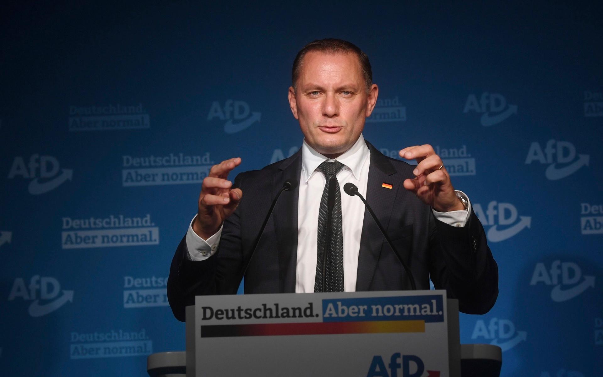 AfD top candidate Tino Chrupalla speaks at the AfD election party after the first forecasts on the outcome of the Bundestag election in Berlin, Sunday, Sept. 26, 2021. Exit polls show the center-left Social Democrats in a very close race with outgoing Chancellor Angela Merkel’s bloc in Germany’s parliamentary election, which will determine who succeeds the longtime leader after 16 years in power.  (Julian Stratenschulte/dpa via AP)  LFP304