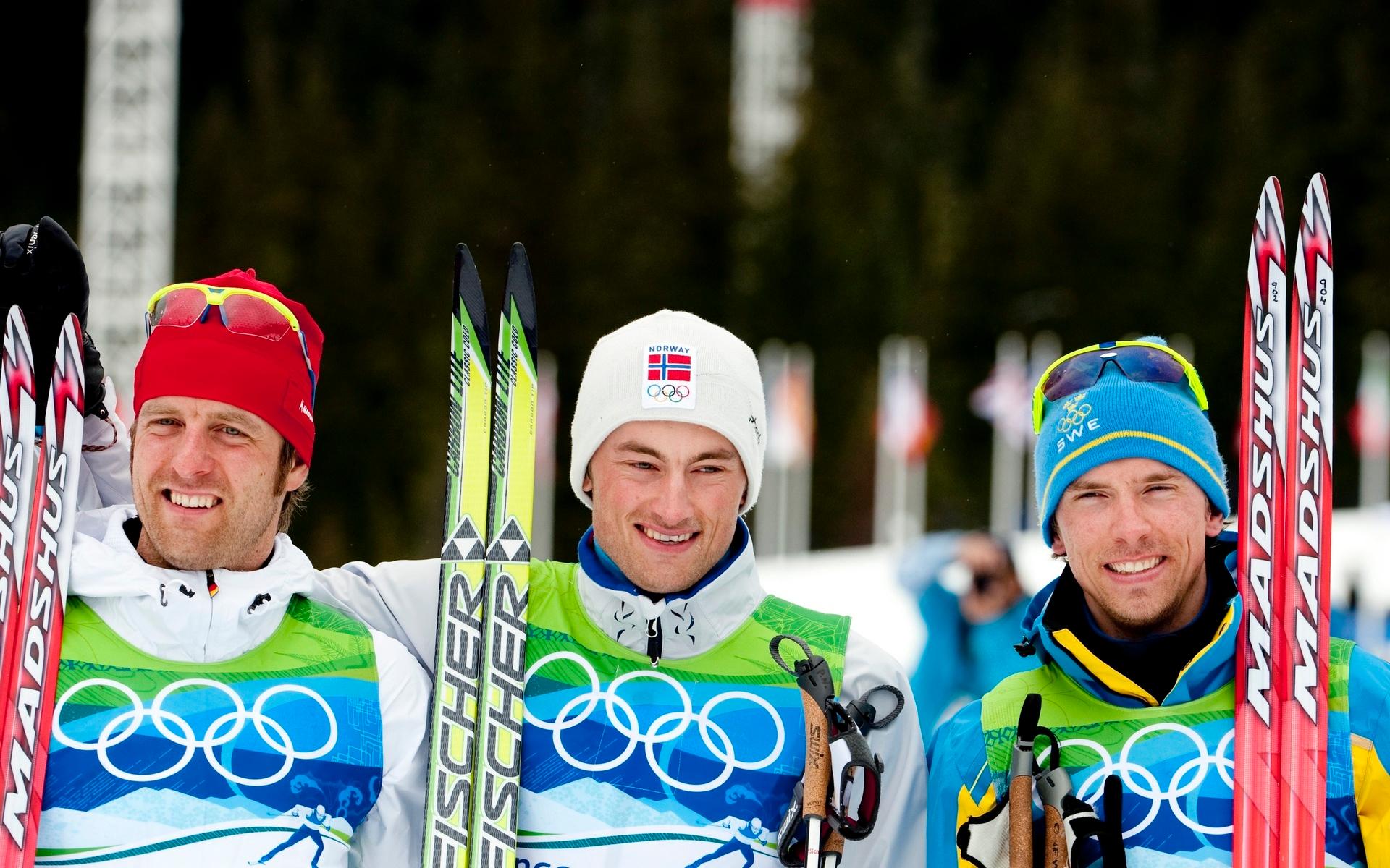 Northug tog guld i 50 kilometer masstart vid OS 2010, före tyske Axel Teichmann som tog silver och svenske Johan Olsson som tog brons.