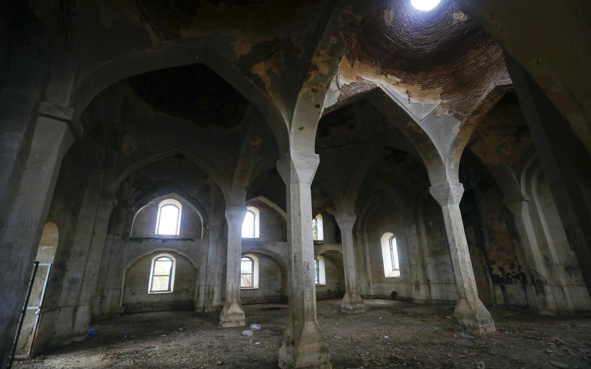 A view onside the Aghdam Mosque in Agdam, prior to the Azerbaijani forces being handed control in the separatist region of Nagorno-Karabakh, Thursday, Nov. 19, 2020. The mosque itself is an especial sore point. In the years after the local population was driven out the mosque was turned into a stable for cattle and swine. Although ethnic Armenian forces tried to keep outsiders away from Aghdam, some camera-bearing visitors slipped in and their photos of the mosque&apos;s defilement outraged Azerbaijanis. (AP Photo/Sergei Grits)  XAZ127